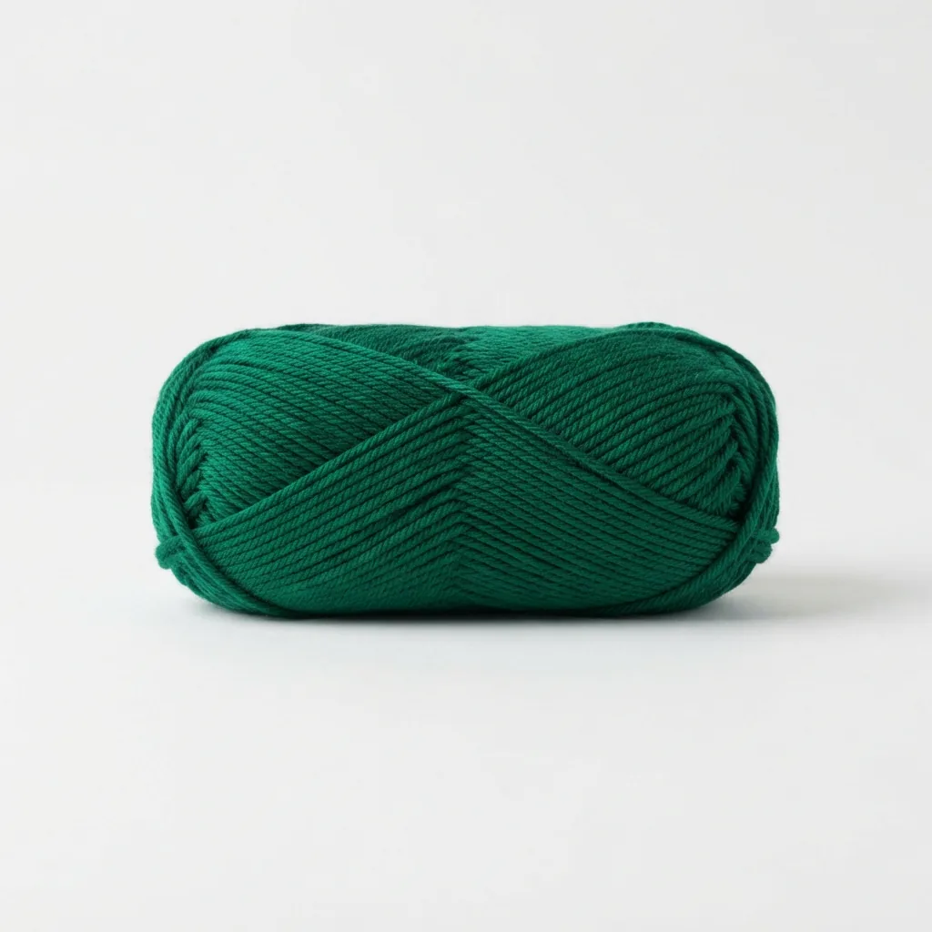 A single skein of Loops & Threads Impeccable Solid Yarn in a rich jewel tone.